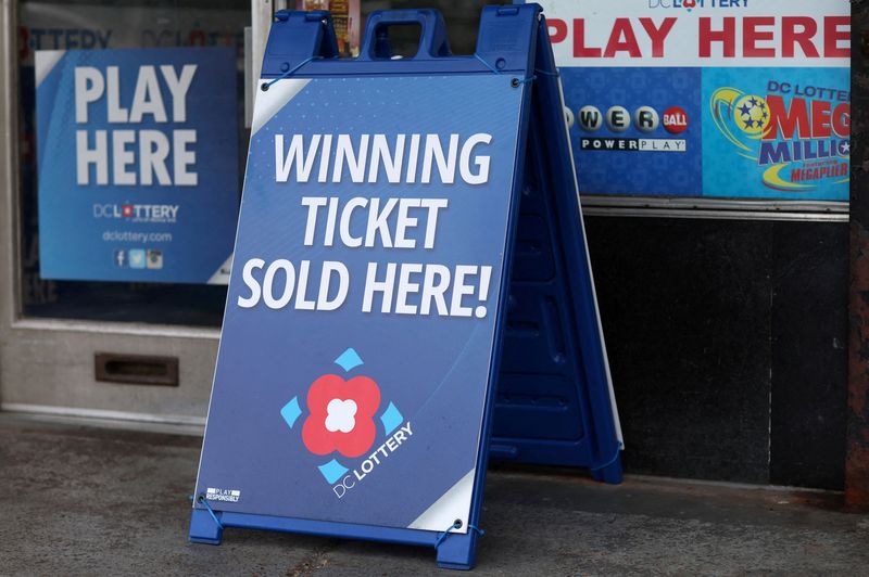 &copy; Reuters. FILE PHOTO: Lottery ticket signs advertising the Mega Millions and Powerball games can be seen in Washington, U.S., July 17, 2023. REUTERS/Leah Millis/File Photo
