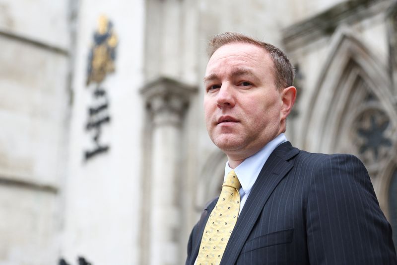 &copy; Reuters. FILE PHOTO: Former trader Tom Hayes poses for the media, as he arrives at the Royal Courts of Justice in London, Britain March 14, 2024. REUTERS/Peter Nicholls/ File photo