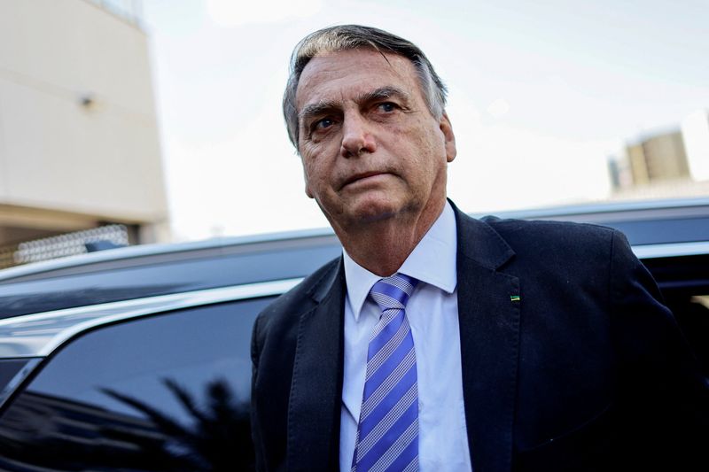 &copy; Reuters. FILE PHOTO: Former Brazilian President Jair Bolsonaro leaves the Federal Police headquarters after testifying about the January 8 riots, in Brasilia, Brazil, October 18, 2023. REUTERS/Ueslei Marcelino/File Photo