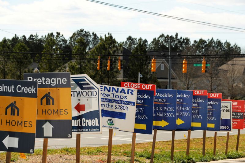 &copy; Reuters. FILE PHOTO: Real estate signs advertise new homes for sale in multiple new developments in York County, South Carolina, U.S., February 29, 2020.  REUTERS/Lucas Jackson/File Photo