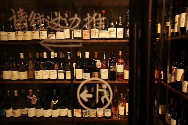 &copy; Reuters. Wine bottles from around the world fill shelves in the cellar of Trio Wine Bar in Beijing, China November 1, 2023. REUTERS/Florence Lo/File Photo