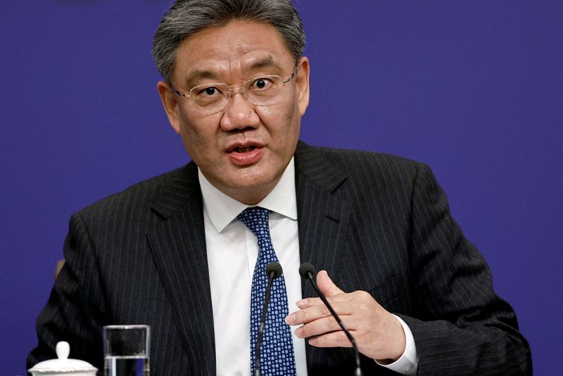 &copy; Reuters. FILE PHOTO: Chinese Commerce Minister Wang Wentao attends a press conference on the sidelines of the National People's Congress (NPC), in Beijing, China March 6, 2024. REUTERS/Tingshu Wang//File Photo