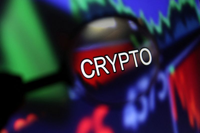&copy; Reuters. Word "Crypto" and stock graph are seen through magnifier displayed in this illustration taken September 4, 2022. REUTERS/Dado Ruvic/Illustration