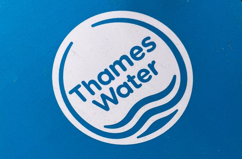 &copy; Reuters. FILE PHOTO: Signage is seen for British utility company Thames Water at a repair site in London, Britain, June 28, 2023. REUTERS/Toby Melville/File Photo