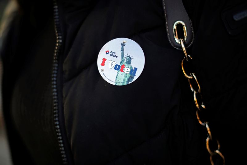 © Reuters. FILE PHOTO: A sticker is seen on a woman's jacket after she cast her ballot during the U.S. presidential election at a polling station in the Bronx Borough of New York, U.S., November 8, 2016. REUTERS/Saul Martinez/File Photo