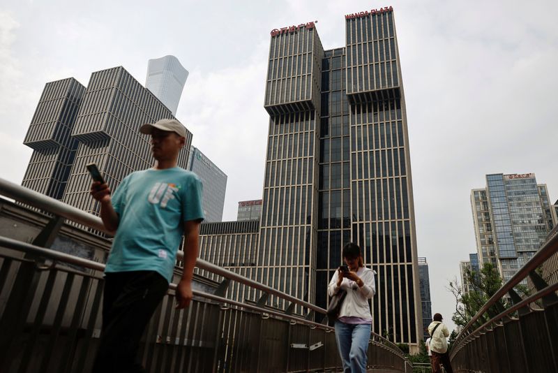 China developer Wanda sells 60% of mall unit in .3 billion deal