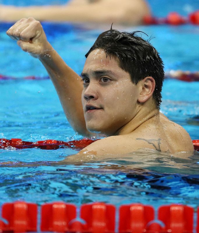 &copy; Reuters. جوزيف سكولينج، السباح الذي فاز بالميدالية الذهبية الأولى والوحيدة حتى الآن لسنغافورة، لدى فوزه بسباق 100 متر فراشة في أولمبياد ريو في صورة م