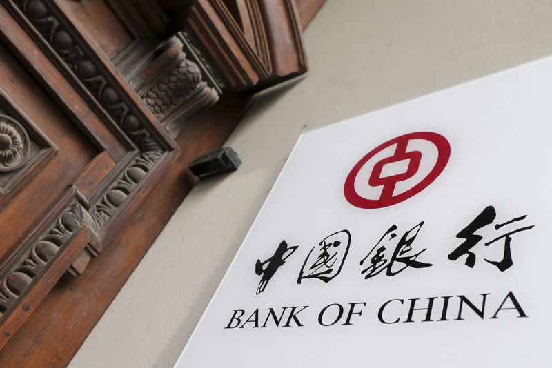 &copy; Reuters. The logo of the Bank of China is pictured at the entrance of the building where its office is located in Vienna, Austria, in this March 8, 2016 file picture. REUTERS/Heinz-Peter Bader/File Photo