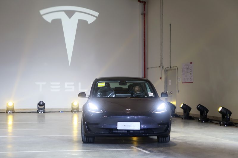 &copy; Reuters. FILE PHOTO: A China-made Tesla Model 3 vehicle is seen at a delivery ceremony in the Shanghai Gigafactory of the U.S. electric car maker in Shanghai, China December 30, 2019.  REUTERS/Yilei Sun/File Photo