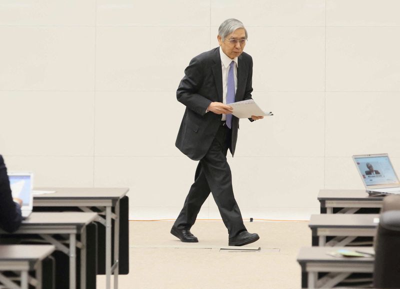 &copy; Reuters. Bank of Japan (BOJ) Governor Haruhiko Kuroda leaves after his last news conference as Japan's central bank chief at the BOJ headquarters in Tokyo, Japan April 7, 2023.  Toru Kawata/Pool via REUTERS/File Photo