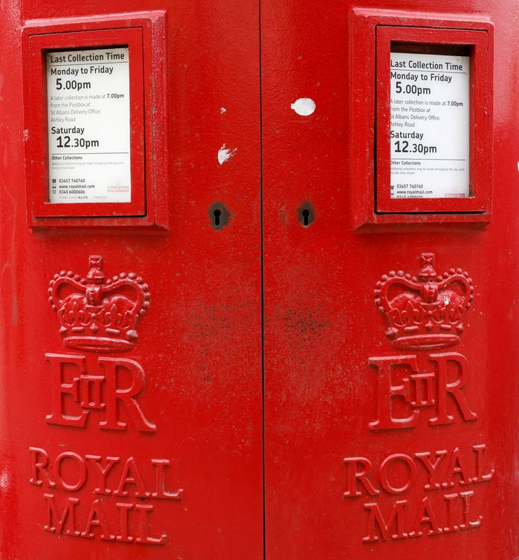 &copy; Reuters. FILE PHOTO: A Royal Mail sign is pictured on a post box outside a Post Office, in St Albans, Britain, May 3, 2022.  REUTERS/Peter Cziborra/File Photo