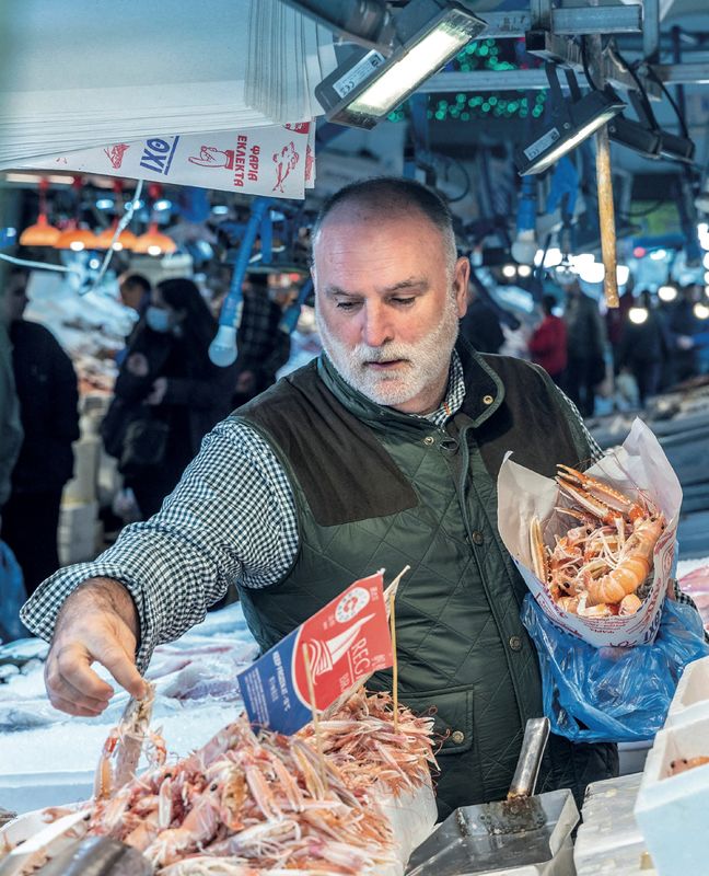 © Reuters. FILE PHOTO: Chef Jose Andres shops at the Athens Central Market in Athens, Greece, in this undated handout image.  Thomas Schauer/Handout via REUTERS/File Photo