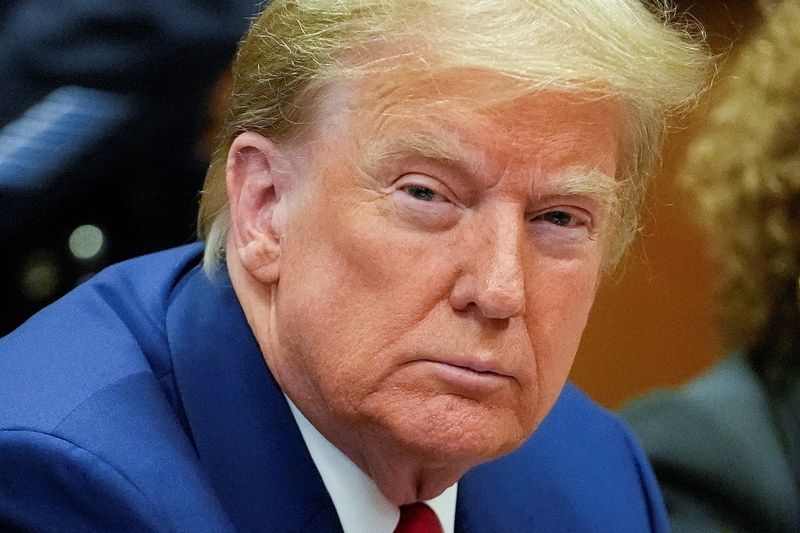 &copy; Reuters. FILE PHOTO: Former U.S. President Donald Trump awaits the start of a pre-trial hearing, on charges stemming from hush money paid to a porn star, in New York City, U.S., March 25, 2024. Mary Altaffer/Pool via REUTERS/File Photo