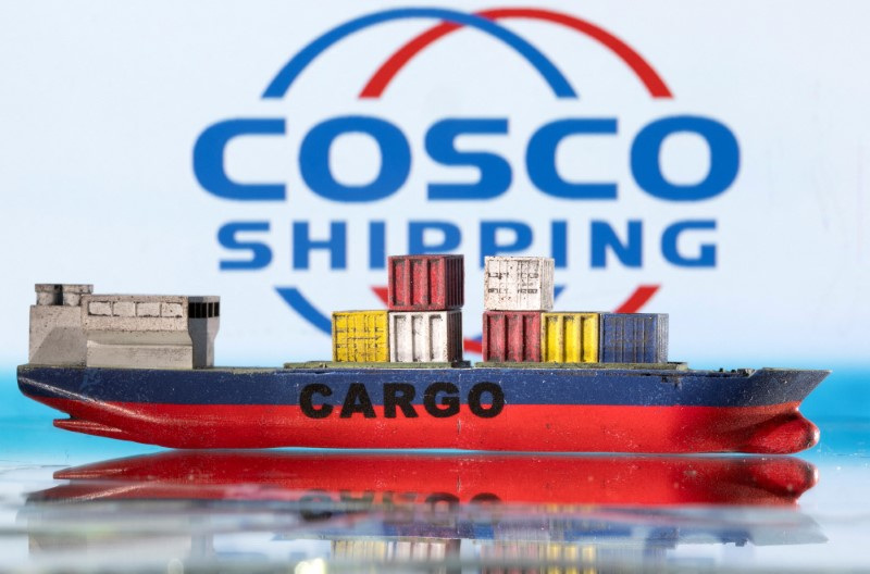 &copy; Reuters. FILE PHOTO: A cargo ship boat model is pictured in front of the China Ocean Shipping Company (COSCO) logo in this illustration taken March 3, 2022. REUTERS/Dado Ruvic/Illustration/File Photo
