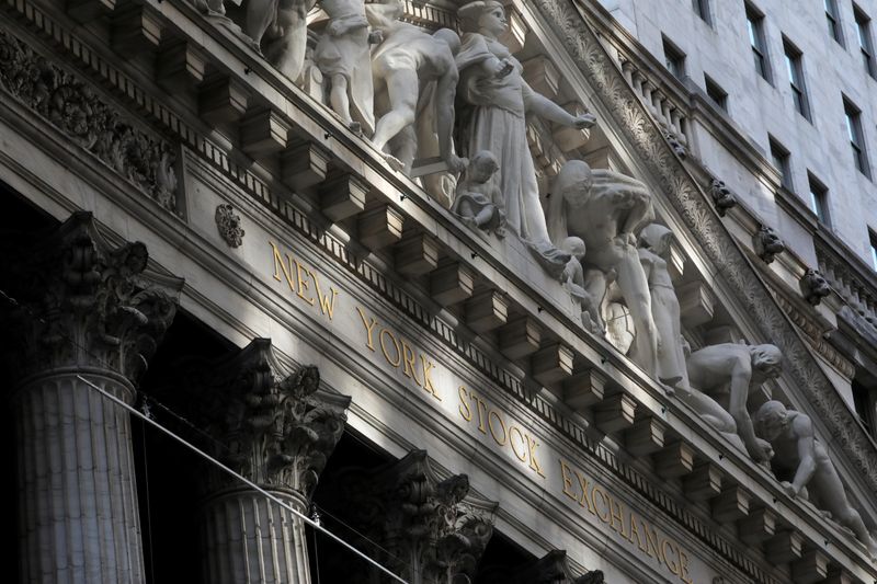 &copy; Reuters. FILE PHOTO: Morning sunlight falls on the facade of the New York Stock Exchange (NYSE) building after the start of Thursday's trading session in Manhattan in New York City, New York, U.S., January 28, 2021. REUTERS/Mike Segar/File Photo