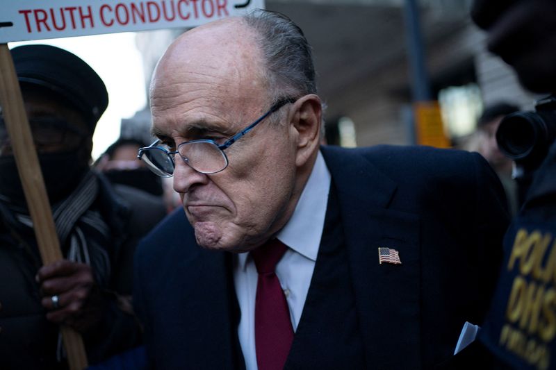 &copy; Reuters. Former New York Mayor Rudy Giuliani departs the U.S. District Courthouse after he was ordered to pay $148 million in his defamation case in Washington, U.S., December 15, 2023. REUTERS/Bonnie Cash