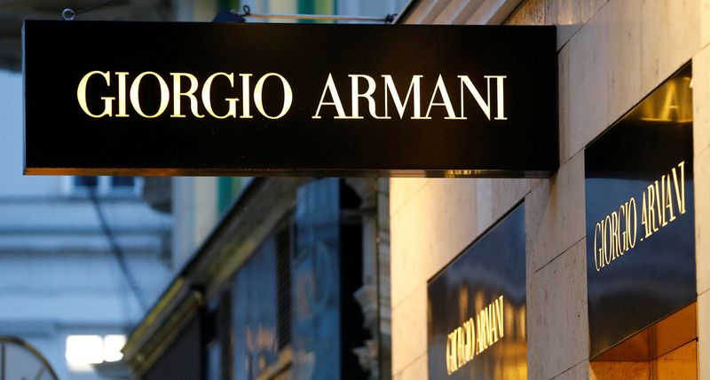 © Reuters. FILE PHOTO: A company logo is pictured outside a Giorgio Armani store in Vienna, Austria, May 4, 2016.  REUTERS/Leonhard Foeger/File Photo