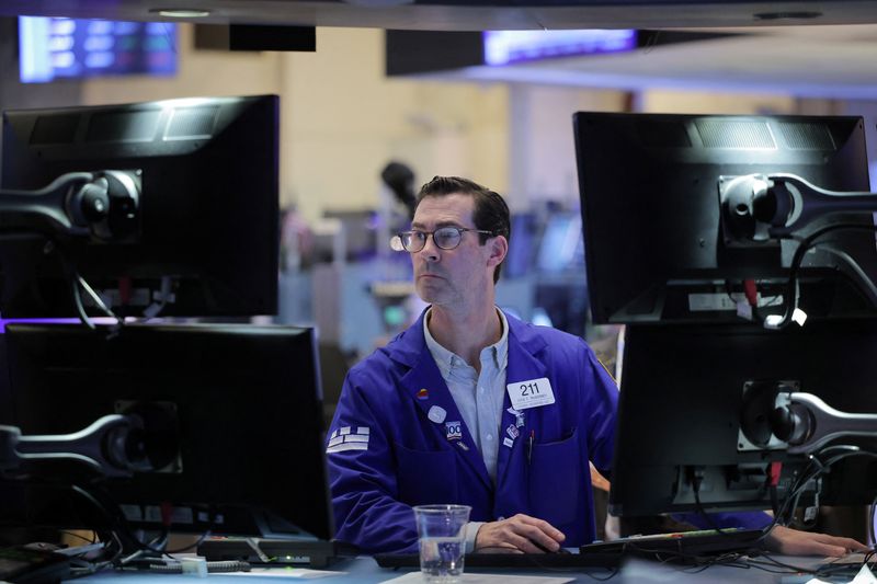 &copy; Reuters. A trader works on the trading floor at the New York Stock Exchange (NYSE) in New York City, U.S., April 5, 2024. REUTERS/Andrew Kelly