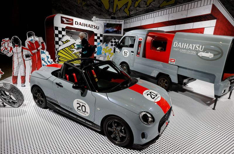 © Reuters. FILE PHOTO: Daihatsu Motor Co's customised 'COPEN' is displayed at Tokyo Auto Salon 2023 at Makuhari Messe in Chiba, east of Tokyo, Japan January 13, 2023. REUTERS/Kim Kyung-Hoon/File Photo