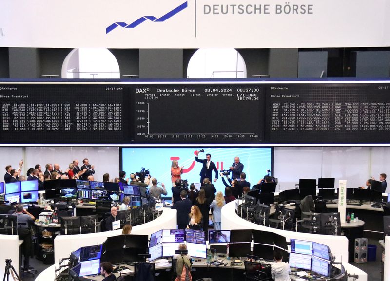 &copy; Reuters. TUI CFO Mathias Kiep rings the opening bell next to TUI CEO Sebastian Ebel as TUI returns to Frankfurt stock exchange, in Frankfurt, Germany April 8, 2024. REUTERS/Joachim Herrmann