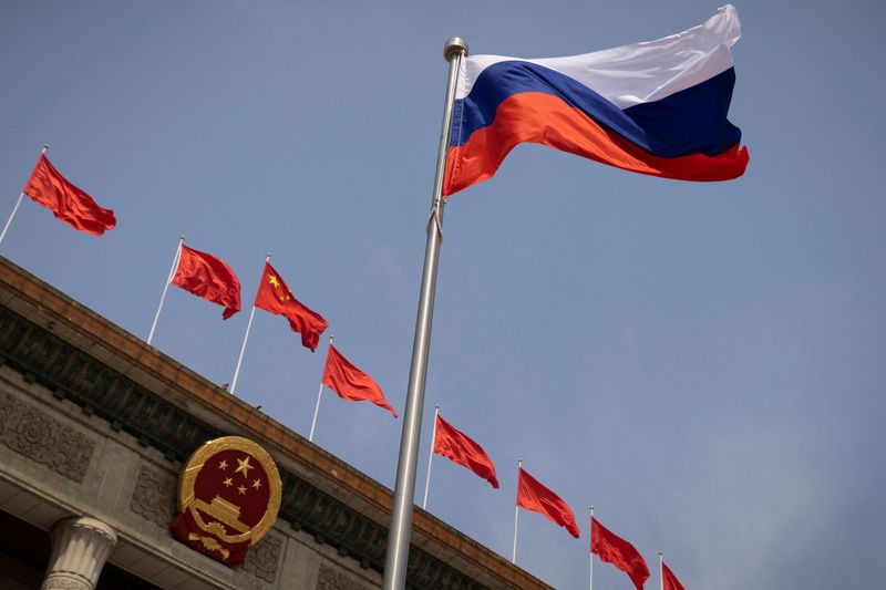 &copy; Reuters. The Russian national flag flies in front of the Great Hall of the People before a welcoming ceremony for Russian Prime Minister Mikhail Mishustin in Beijing, China, May 24, 2023. REUTERS/Thomas Peter/Pool/File Photo