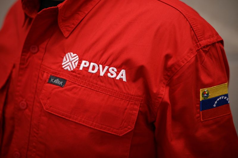 &copy; Reuters. Funcionário da PDVSA na sede da empresa em Caracas
18/12/2023
REUTERS/Gaby Oraa