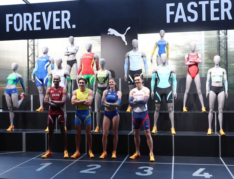 © Reuters. Olympics - Puma launches a new brand campaign with Olympic athletes - Mob House, Paris, France - April 10, 2024 Qatar's Mutaz Barshim, Sweden's Armand Duplantis, Ukraine's Yaroslava Mahuchikh and Norway's Karsten Warholm pose during the launch REUTERS/Yves Herman