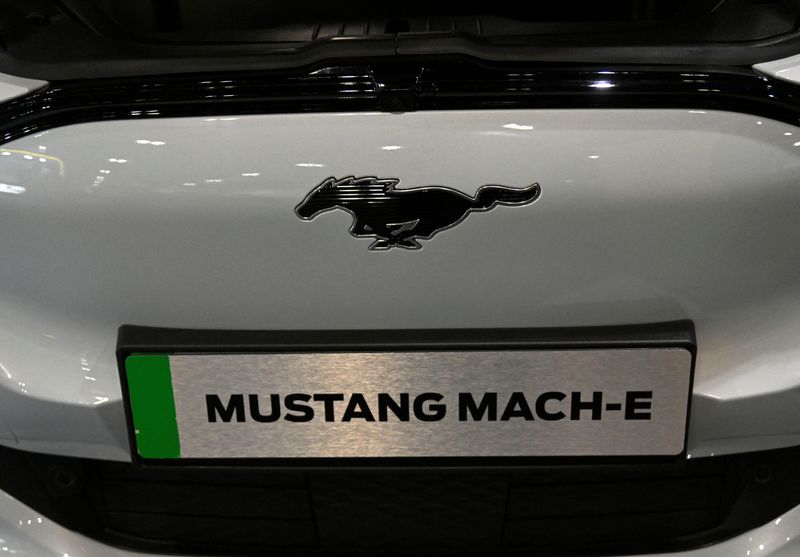 &copy; Reuters. FILE PHOTO: Branding is seen on a Ford Mustang Mach-E electric car displayed at the London EV Show, in London, Britain, November 29, 2022. REUTERS/Toby Melville/File Photo