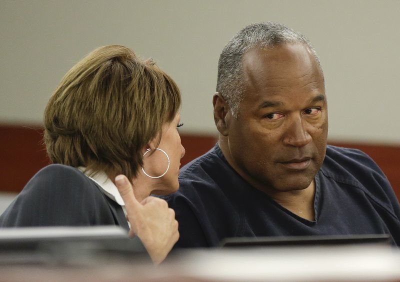 &copy; Reuters. FILE PHOTO: O.J. Simpson (R) sits with his attorney, Patricia Palm in Clark County District Court during his evidentiary hearing in Las Vegas, Nevada May 13, 2013. REUTERS/Julie Jacobson/Pool/File Photo