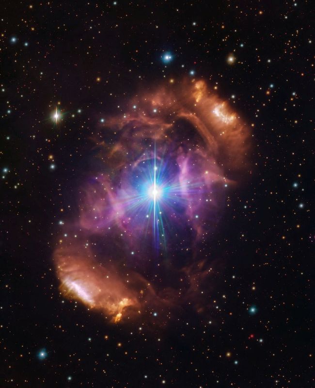 &copy; Reuters. The nebula NGC 6164/6165, also known as the Dragon's Egg, a cloud of gas and dust surrounding a pair of stars called HD 148937, is seen in this undated handout image taken with the VLT Survey Telescope hosted at the European Southern Observatory's Paranal