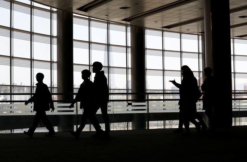 &copy; Reuters. FILE PHOTO: University students walk during a job fair in Seoul, South Korea, April 12, 2017.  REUTERS/Kim Hong-Ji/File photo