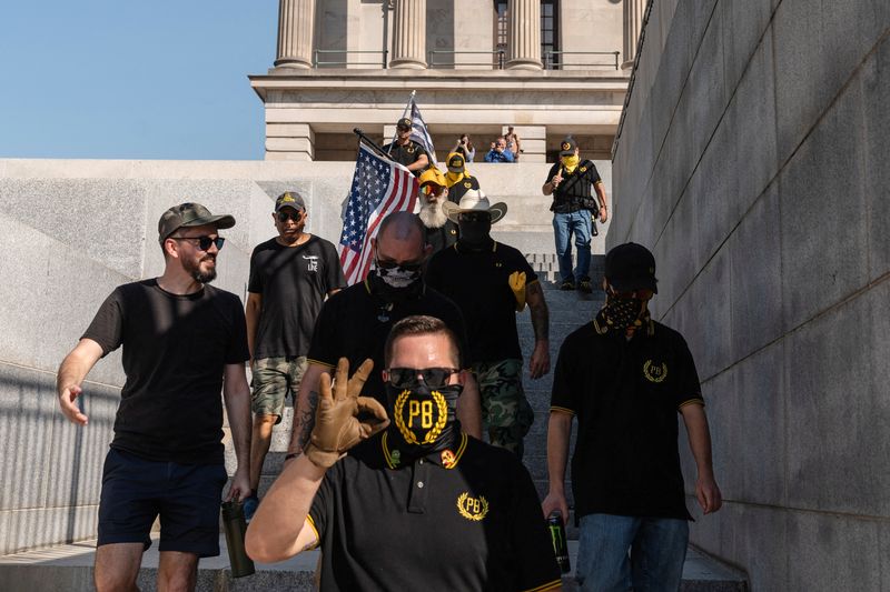 &copy; Reuters. FILE POTO: Members of the Proud Boys gather in front of the Tennessee State Capitol ahead of a special session on public safety in Nashville, Tennessee, U.S., August 21, 2023. REUTERS/Cheney Orr/File Photo