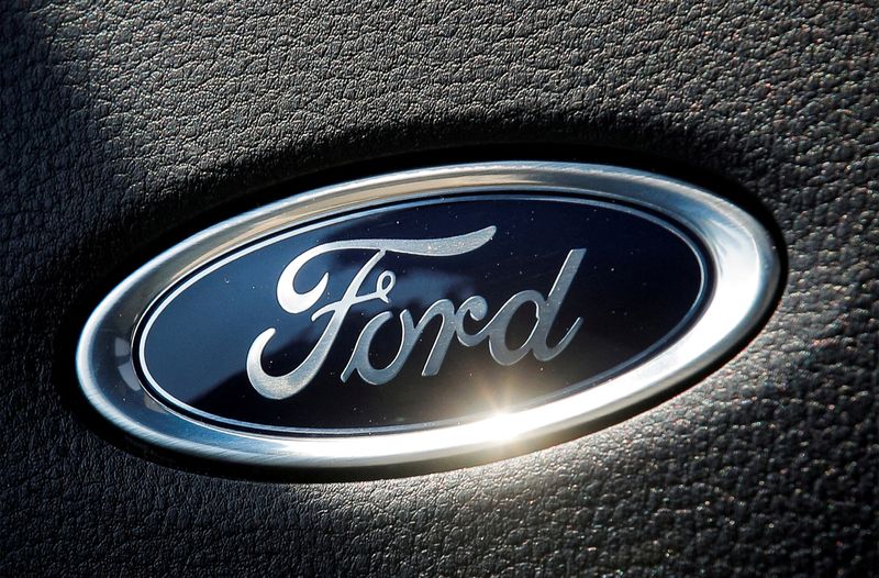 © Reuters. FILE PHOTO: The Ford name plate is seen on the interior of a Ford F-150 Lightning pickup truck during a press event in New York City, U.S., May 26, 2021.  REUTERS/Brendan McDermid/File Photo