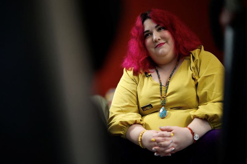 © Reuters. Cristina Paredero, disability rights activist and forced sterilisation survivor listens to a question during an interview with Reuters in Madrid, Spain, February 8, 2024. REUTERS/Juan Medina