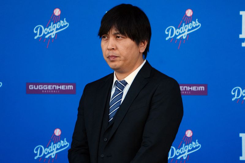 © Reuters. FILE PHOTO: Dec 14, 2023; Los Angeles, CA, USA; Ippei Mizuhara, the translator for Los Angeles Dodgers designated hitter Shohei Ohtani, during an introductory press conference at Dodger Stadium. Mandatory Credit: Kirby Lee-USA TODAY Sports/File Photo