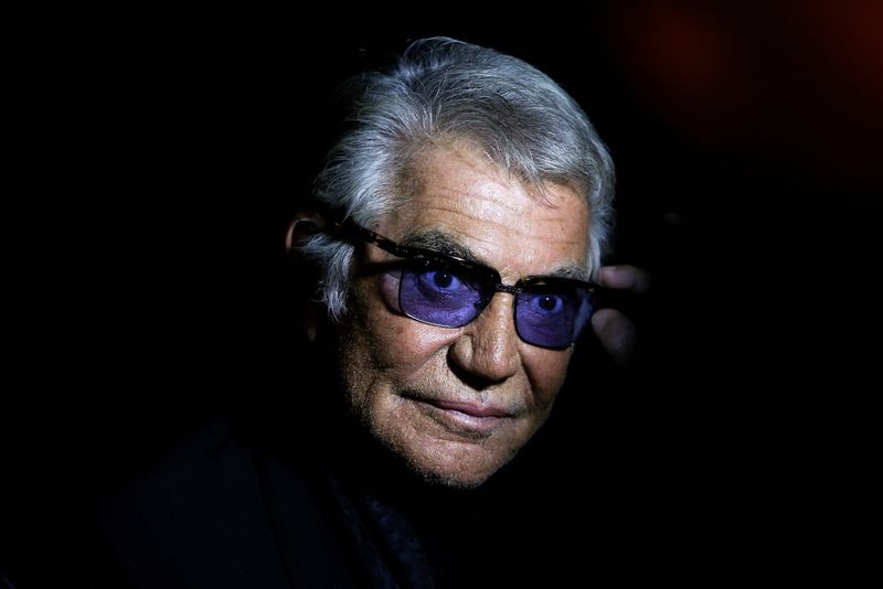 &copy; Reuters. FILE PHOTO: Italian designer Roberto Cavalli poses before the start of his Spring/Summer 2014 collection during Milan Fashion Week September 21, 2013. REUTERS/Max Rossi/File Photo