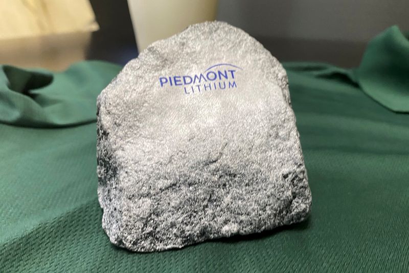 &copy; Reuters. FILE PHOTO: A rock stamped with a logo is displayed at Piedmont Lithium's headquarters in Belmont, Gaston County, North Carolina, U.S., July 16, 2021. Picture taken July 16, 2021.   REUTERS/Ernest Scheyder/File Photo