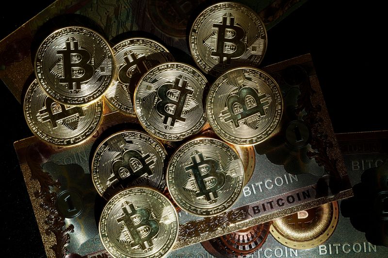 &copy; Reuters. FILE PHOTO: Representations of cryptocurrency Bitcoin are seen in this illustration picture taken in Paris, France, March 9, 2024. REUTERS/Benoit Tessier/Illustration/File Photo