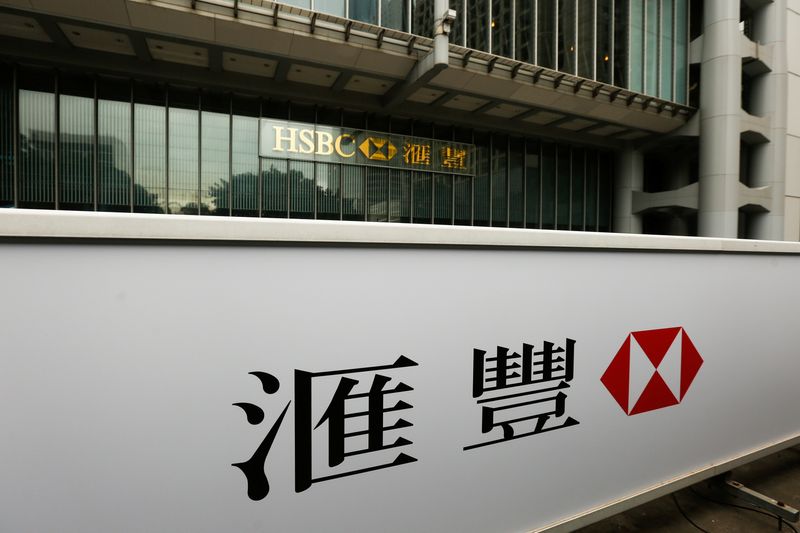 &copy; Reuters. FILE PHOTO: A logo of HSBC is displayed at a tram station outside its headquarters building in Hong Kong, China February 21, 2017. REUTERS/Bobby Yip/File Photo