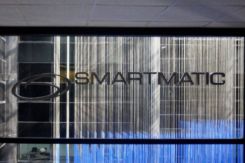 &copy; Reuters. FILE PHOTO: The corporate logo of Smartmatic is seen at its offices in Caracas, Venezuela August 2, 2017. REUTERS/Christian Veron/File Photo