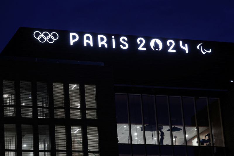 &copy; Reuters. The Olympics rings and the logos of the Paris 2024 Olympics and Paralympics Games are pictured on the Pulse building, the headquarters of the Paris 2024 Olympics organizing committee, in Saint-Denis near Paris, France, March 21, 2024. REUTERS/Stephanie Le