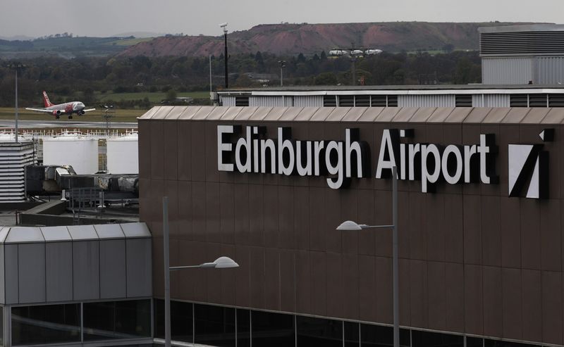 &copy; Reuters. FILE PHOTO: An aircraft lands at Edinburgh Airport in Scotland April 23, 2012. REUTERS/David Moir/File Photo