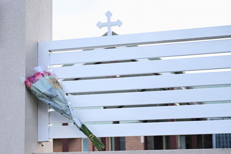 &copy; Reuters. Flowers are laid outside the Assyrian Christ The Good Shepherd Church after a knife attack took place during a service the night before, in Wakeley in Sydney, Australia, April 16, 2024. REUTERS/Jaimi Joy