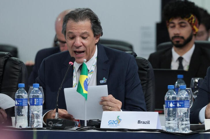 &copy; Reuters. ２０２４年の２０カ国・地域（Ｇ２０）議長国を務めるブラジルのアダジ財務相は１８日、米利下げ開始が遅れる見通しから世界的な資産再評価の動きが見られ、債務に関する議論の緊急性