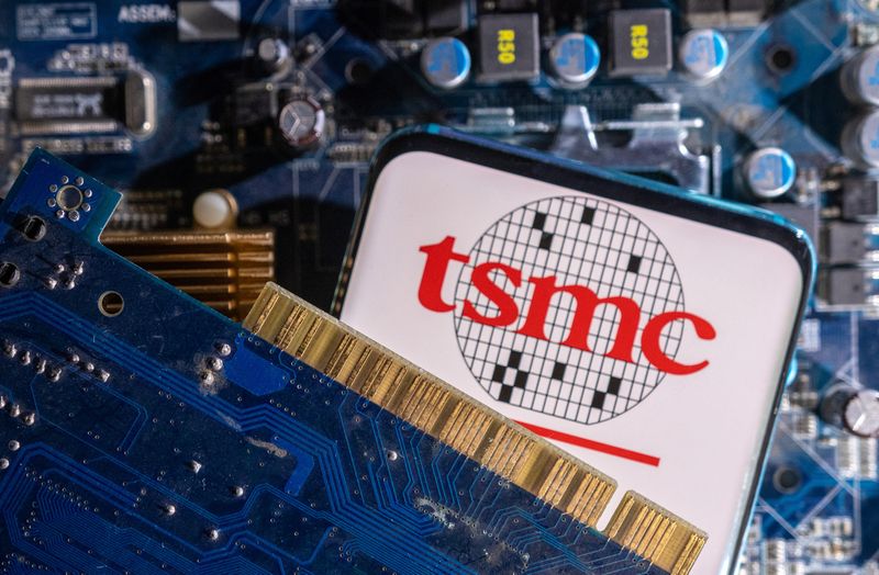 &copy; Reuters. A smartphone with a displayed TSMC (Taiwan Semiconductor Manufacturing Company) logo is placed on a computer motherboard in this illustration taken March 6, 2023. REUTERS/Dado Ruvic/Illustration/File Photo