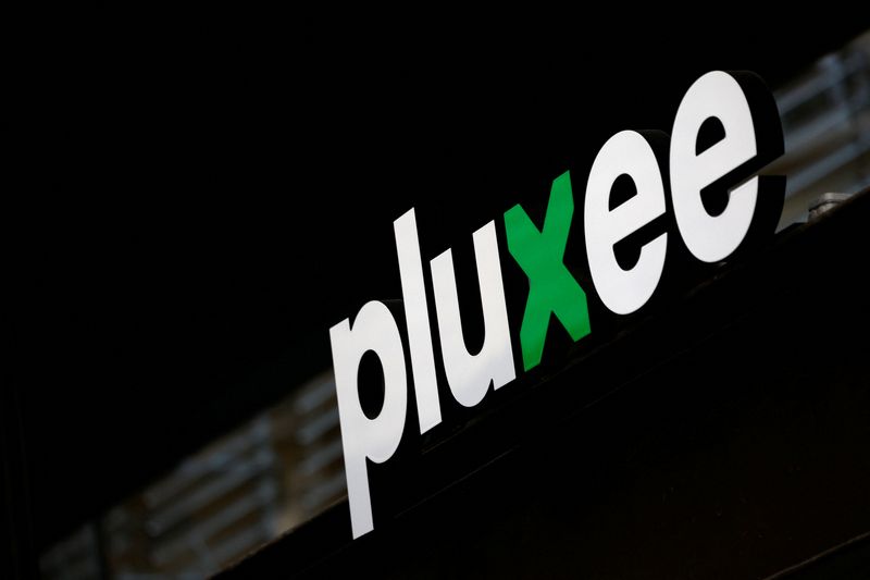 &copy; Reuters. The logo of Pluxee, the voucher and benefits unit of French catering and food services group Sodexo, is seen at the company headquarters in Paris, France, February 5, 2024. REUTERS/Sarah Meyssonnier/File photo
