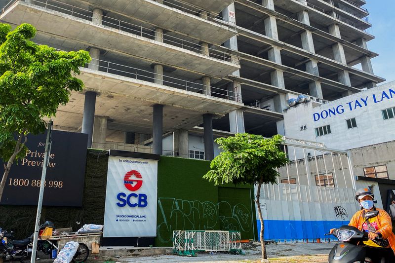 &copy; Reuters. FILE PHOTO: A logo of Saigon Joint Stock Commercial Bank (SCB) is seen in front of an under-construction building in Ho Chi Minh City, Vietnam, November 30, 2023. REUTERS/Francesco Guarascio/File Photo