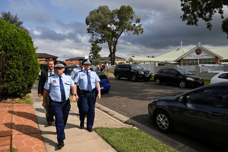 &copy; Reuters. FILE PHOTO: Police depart the Assyrian Christ The Good Shepherd Church after a knife attack took place during a service on Monday night, in Wakeley, Sydney, Australia, April 17, 2024. REUTERS/ Jaimi Joy/File Photo