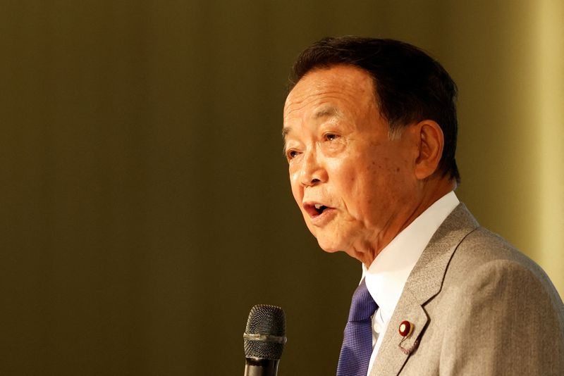 &copy; Reuters. FILE PHOTO: Japan's Former Prime Minister and current Vice-President of the ruling Liberal Democratic Party, Taro Aso, speaks during the Ketagalan Forum in Taipei, Taiwan August 8, 2023. REUTERS/Carlos Garcia Rawlins/File Photo