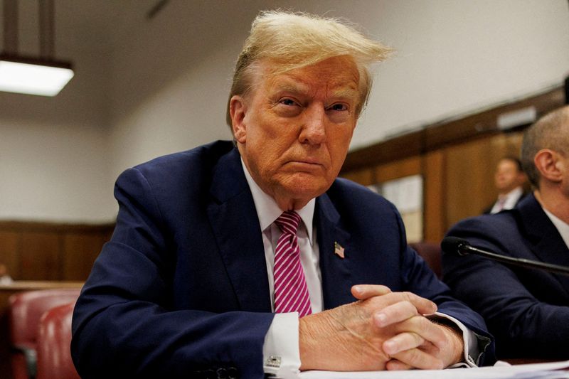 &copy; Reuters. FILE PHOTO: Former U.S. President and current Republican presidential candidate Donald Trump sits at the defendant's table at Manhattan Criminal Court in New York, U.S., 19 April 2024. Sarah Yenesel/Pool via REUTERS/File Photo